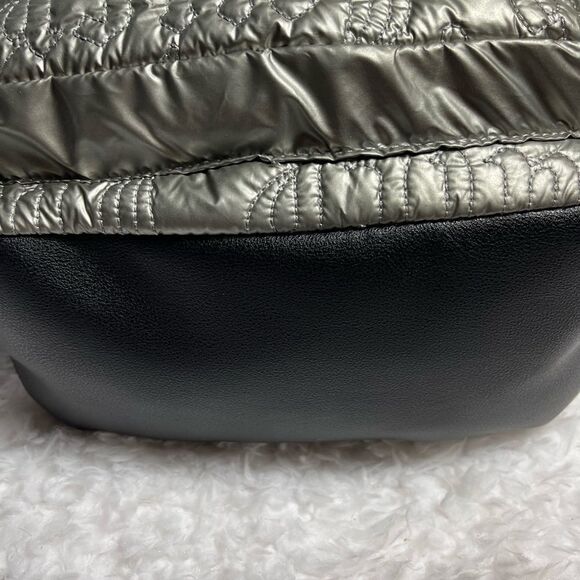 Juicy Couture Metallic quilted silver Backpack with black trim. - Picture 4 of 16